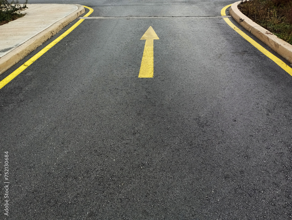 black ground asphalt one-way traffic passing direction, forward direction black ground asphalt one-way traffic passing direction, forward direction