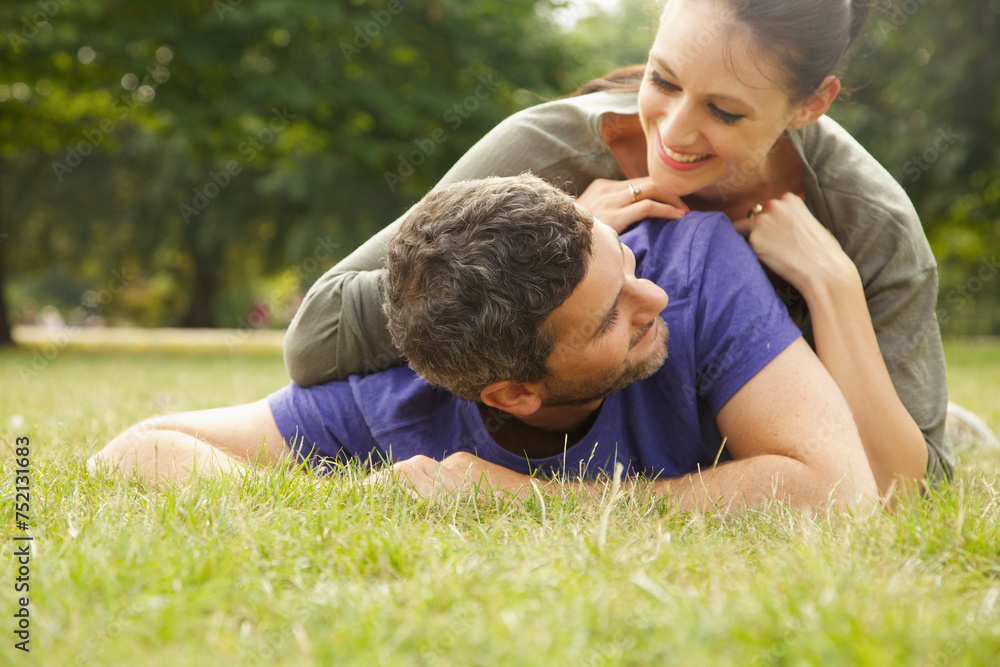 Smiling Couple Lying on Grass
Smiling Couple Lying on Grass