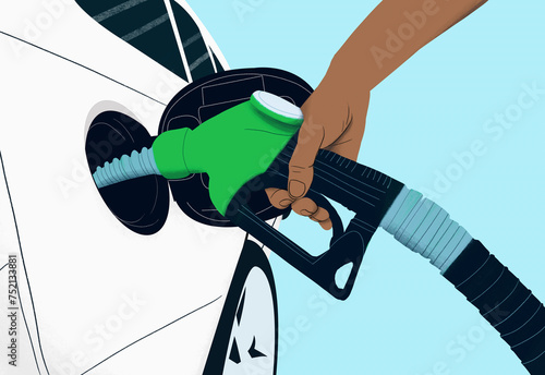 Close up hand holding green biofuel gas pump, refueling car
 photo