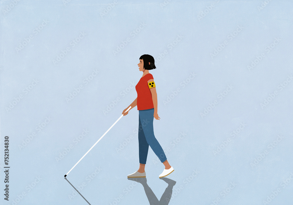 Blind woman walking with walking cane on blue background
Blind woman walking with walking cane on blue background