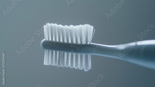A toothbrush with white bristles
