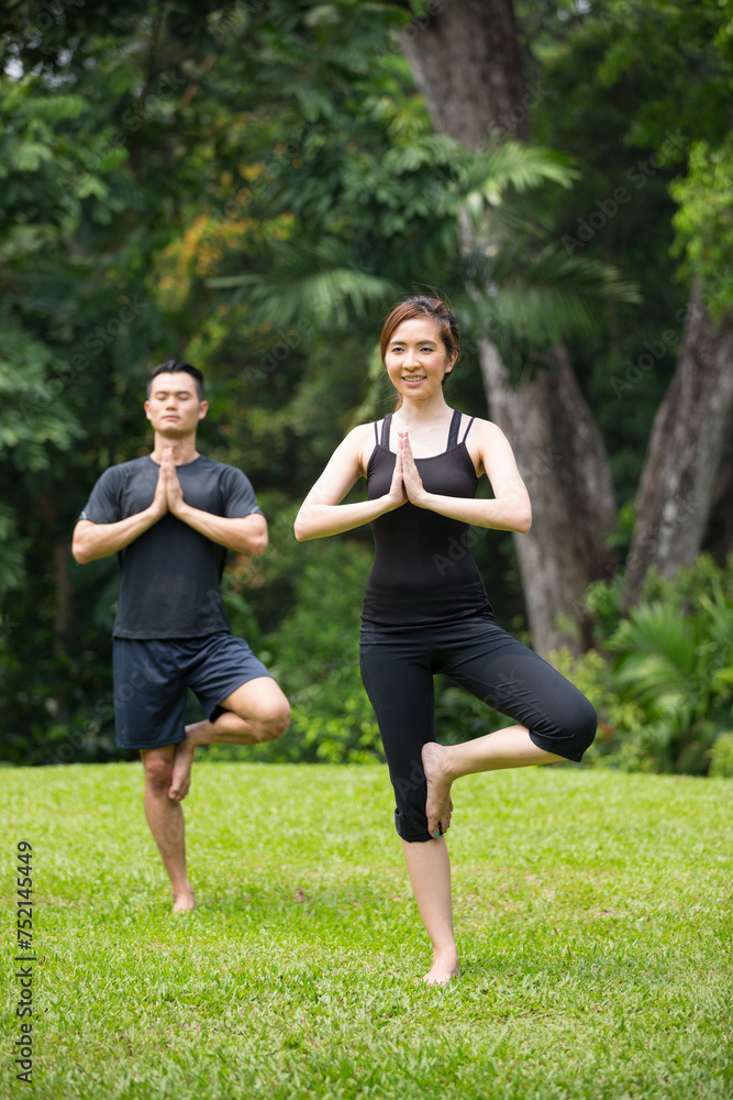 Chinese man practicing Tai Chi outdoors. Chinese man practicing Tai Chi outdoors.