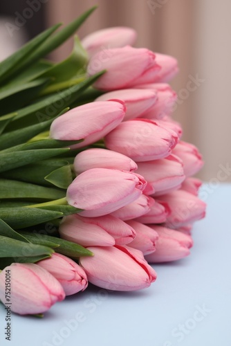 Fototapeta Naklejka Na Ścianę i Meble -  Bouquet of beautiful pink tulips on light grey background, closeup