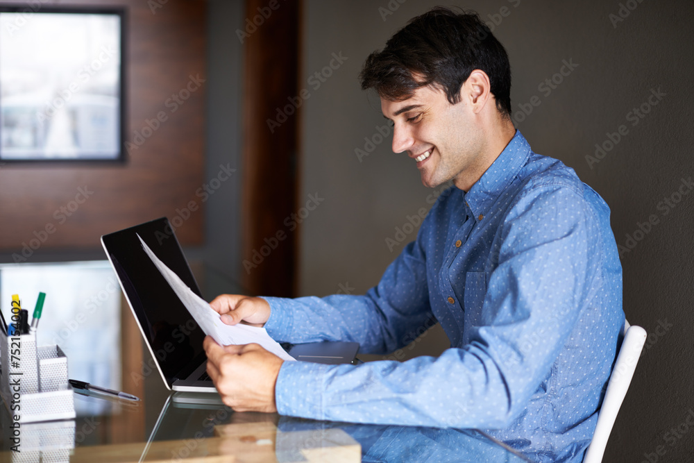 Laptop, documents and business man in office for proposal, project review and company report. Professional, consultant and person with paperwork and computer for information, research and planning