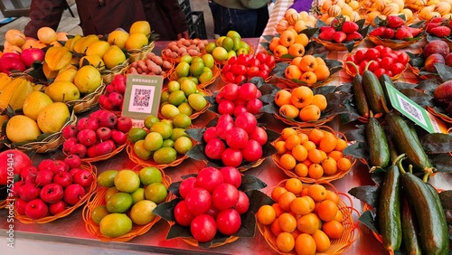 Assorted fruits and vegetables in baskets at a vibrant market  Shilin Stone Forest  China