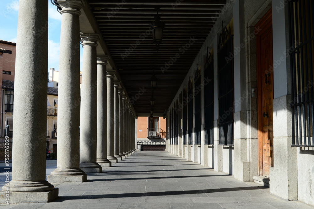 Arcades and columns in the Plaza de Zocodover in Toledo, Spain.