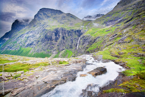 Waterfall and mountains near the viewpoint over Trollstigen road  Norway