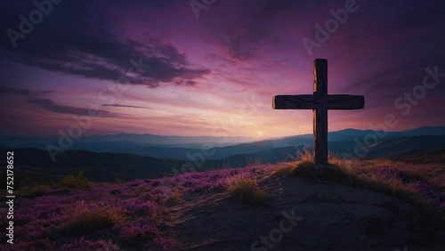 Cross Christian on the hill with sunset background loop photo