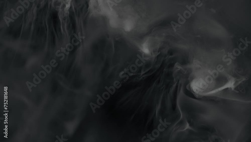 Super Slow Motion Shot of Real Smoke Slowly Swirling on Black Background at 1000fps. photo
