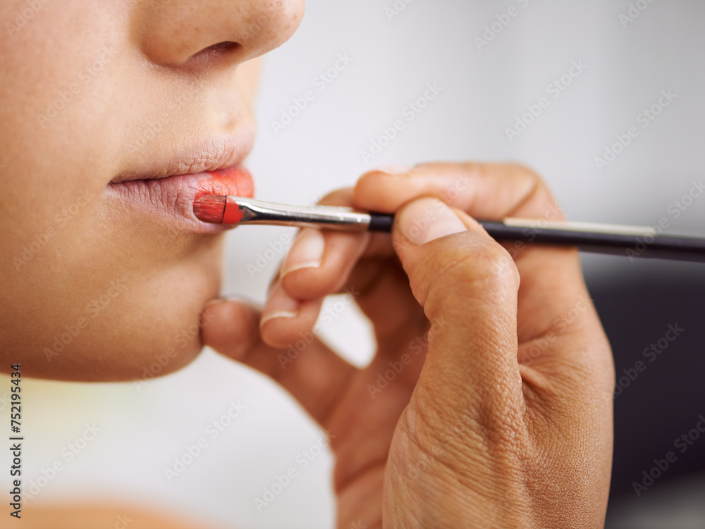 Closeup, woman and makeup brush on lips for beauty with hands, application of cosmetics product and glamour. Person, mouth and color lipstick for skincare, aesthetic makeover and cosmetology at salon