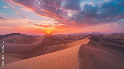 Sunrise over sand dunes