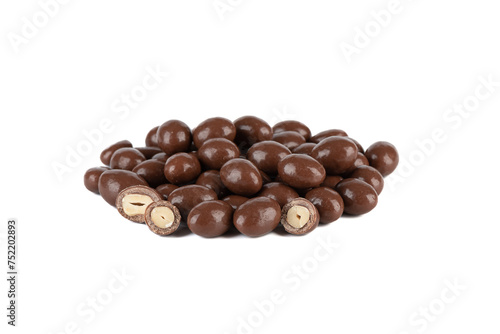 A pile of dark chocolate covered peanuts on a white background. © svdolgov