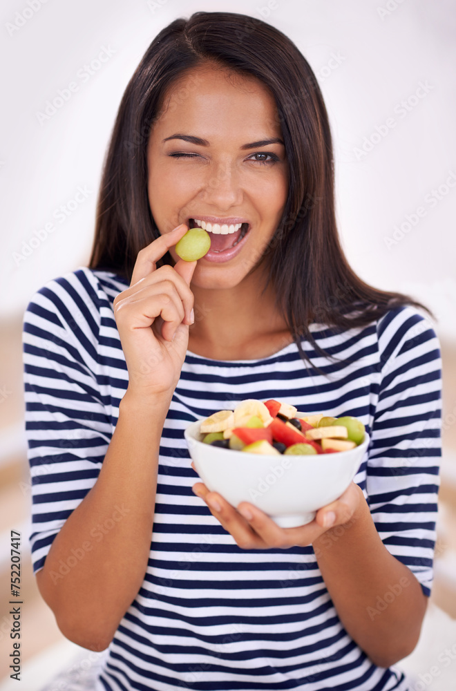 Fruit, portrait and wink for healthy eating, bowl and wink with fresh food. Natural, nutrition or sustainable for vegetarian, fiber and breakfast or dessert for minerals and vitamins with grape Fruit, portrait and wink for healthy eating, bowl and wink with fresh food. Natural, nutrition or sustainable for vegetarian, fiber and breakfast or dessert for minerals and vitamins with grape