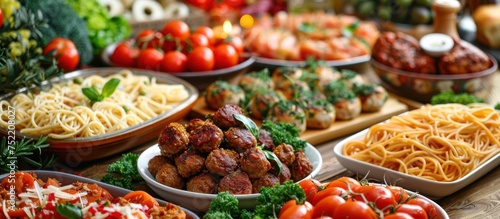 A table laden with various types of food, showcasing a diverse spread of dishes including fruits, vegetables, meats, cheeses, bread, and desserts.
