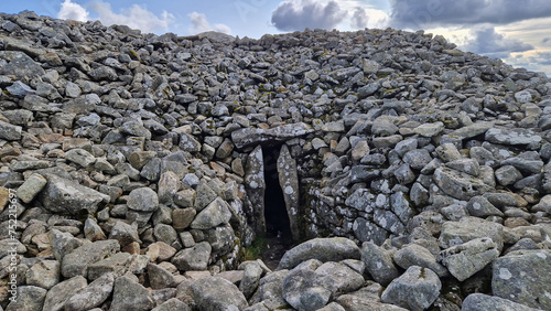 The dignified facade of Seefin Passage Tomb, an enduring testament to the artistry and reverence of ancient builders, beckoning visitors to explore the mysteries within.
