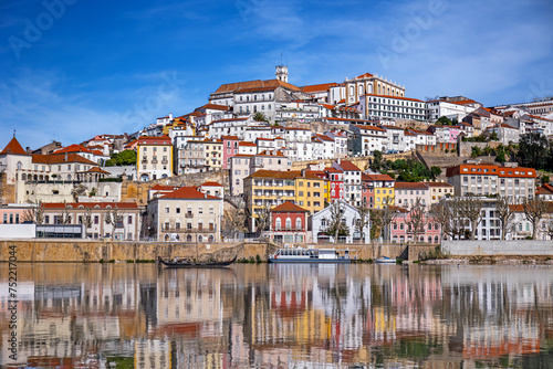 A picturesque panorama of Coimbra with the reflection in the Mondego river