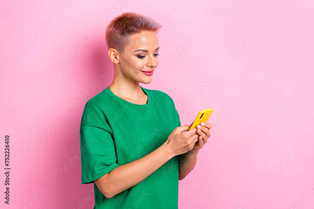 Photo of cute girl popular blogger chatting writing answer comment twitter instagram isolated on pink color background Photo of cute girl popular blogger chatting writing answer comment twitter instagram isolated on pink color background