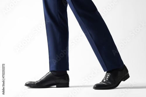 Businessman in leather shoes on white background, closeup