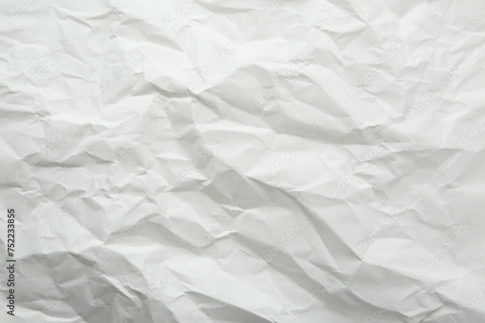 Crumpled notebook sheet as background, top view Crumpled notebook sheet as background, top view