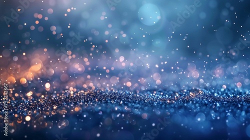Abstract background featuring twinkling blue glitter and soft light effects, ideal for festive occasions.