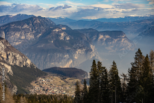 Ski resort Paganella Andalo, Trentino-Alto Adige, Italy. Ski slopes and snow holidays in Andalo in the Italian Dolomites, ski resort in the Alps. Snow covered Italian Dolomites at winter. photo