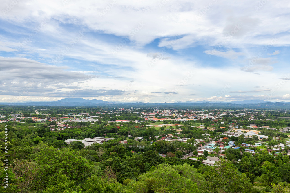 Beautiful Nan valley with town, mountains and sky in Nan province, North Thailand. View from Wat Khao Noi.