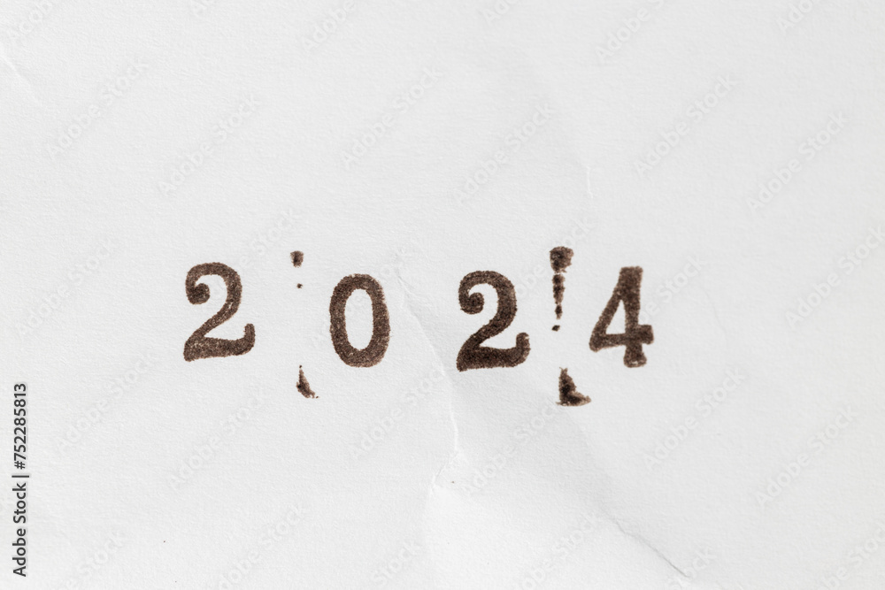 Ink stamp 2024 number isolated on white paper background Ink stamp 2024 number isolated on white paper background