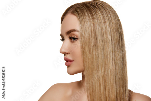 Portrait of beautiful young woman with smooth blonde hair and well-kept skin isolated over white studio background. Keratin straightening. Concept of natural beauty, cosmetology, cosmetics, skincare