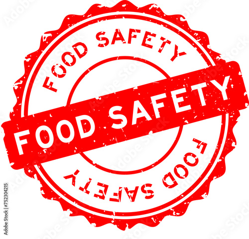 Grunge red food safety word round rubber seal stamp on white background