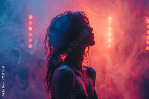 A mysterious woman stands confidently in front of a stage engulfed in smoke, exuding an air of intrigue and allure