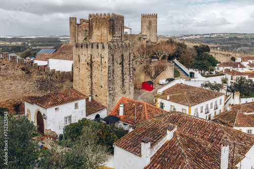 Cityscape with the castle in UNESCO World heritage town of Óbidos, Leiria, Portugal.	 photo