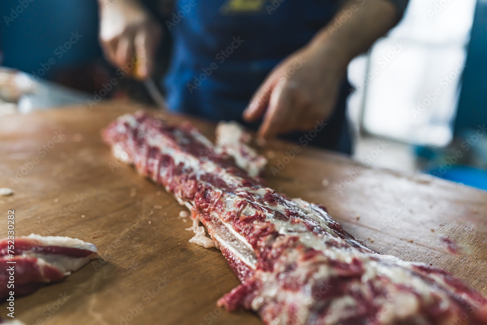 Meat on bones, ready for preparing. Manufacturing of meat concept. Fresh pig ribs. High quality photo