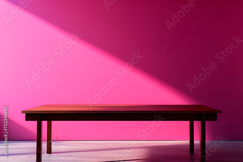 empty room with a table and pink wall