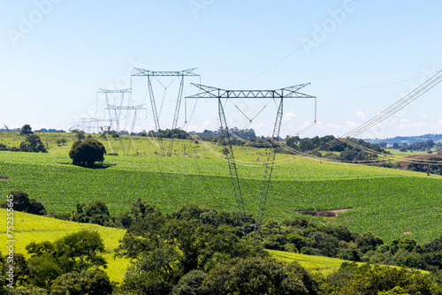 High voltage power towers on a farm © Pedro