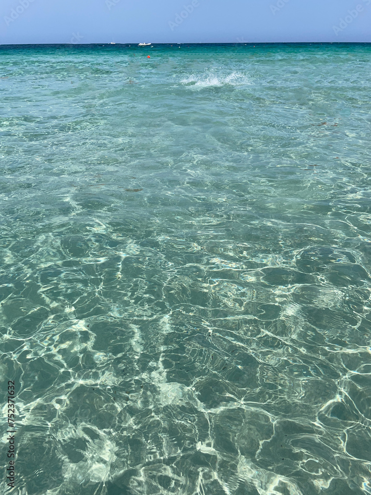 Turquoise sea water in Isuledda Beach in San Teodoro, Sardinia, Italy Turquoise sea water in Isuledda Beach in San Teodoro, Sardinia, Italy