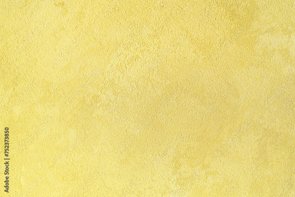 Texture of golden decorative plaster or concrete. Abstract gold grunge background. Texture of golden decorative plaster or concrete. Abstract gold grunge background.