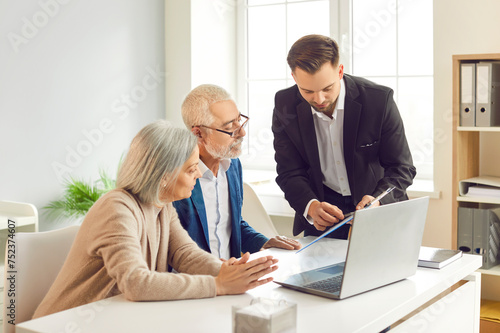 Senior couple talking with realtor on purchasing property navigating intricacies of home ownership. Real estate broker senior couple real estate investment Senior couple consulting about real estate