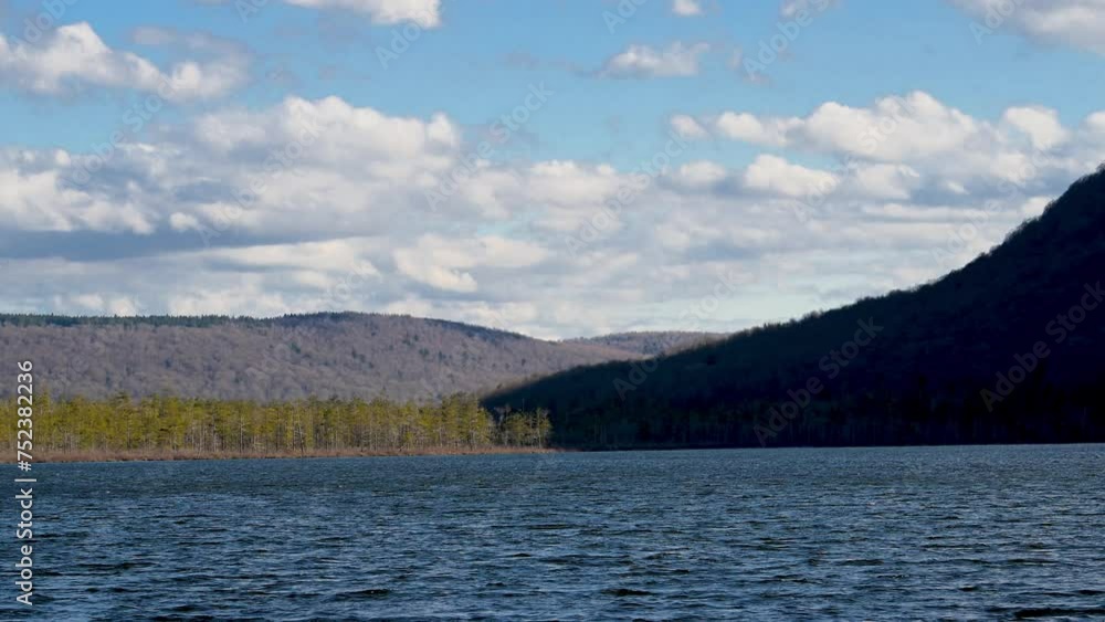 Looking out over Labrador Pond while walking the boardwalk that takes you around and through a swamp at Labrador Hollow Unique Area in Tully NY. Looking out over Labrador Pond while walking the boardwalk that takes you around and through a swamp at Labrador Hollow Unique Area in Tully NY.