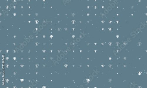 Seamless background pattern of evenly spaced white elephant heads of different sizes and opacity. Vector illustration on blue gray background with stars photo