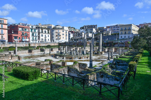 The ruins of an ancient Roman amphitheater in Pozzuoli, a town in Campania, Italy.