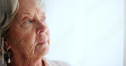 Elderly, woman and thinking of future in home with dementia, alzheimer or anxiety for mental health. Senior, person and confused by memory in retirement with fear or worry for healthcare or insurance photo