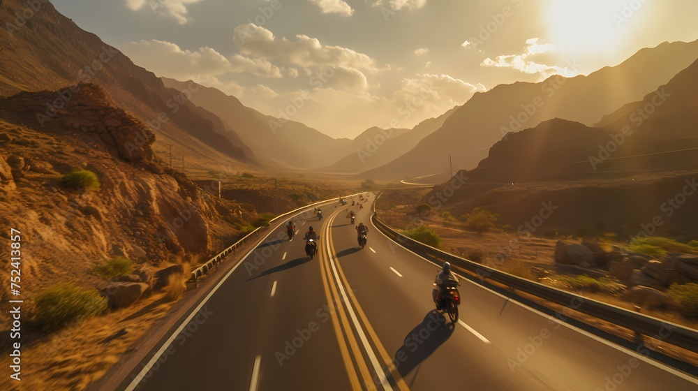 An overhead view of a motorcycle rider cruising along an empty highway, capturing the sense of freedom and speed