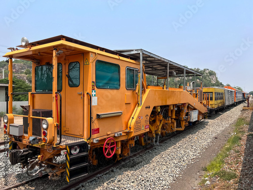 The ballast tamping machine is parking.