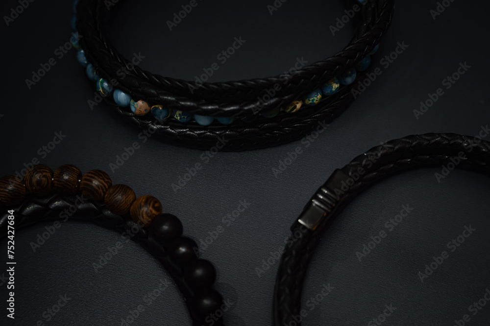 Fototapeta premium Dark accessories still life with focus on textures.