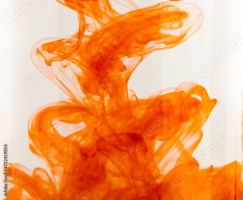 Orange paint in water