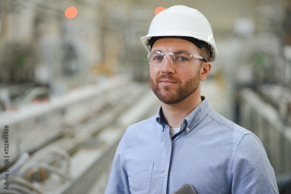 Engineer,Industry and construction concept. Portrait of caucasian Industry factory maintenance engineer Engineer,Industry and construction concept. Portrait of caucasian Industry factory maintenance engineer