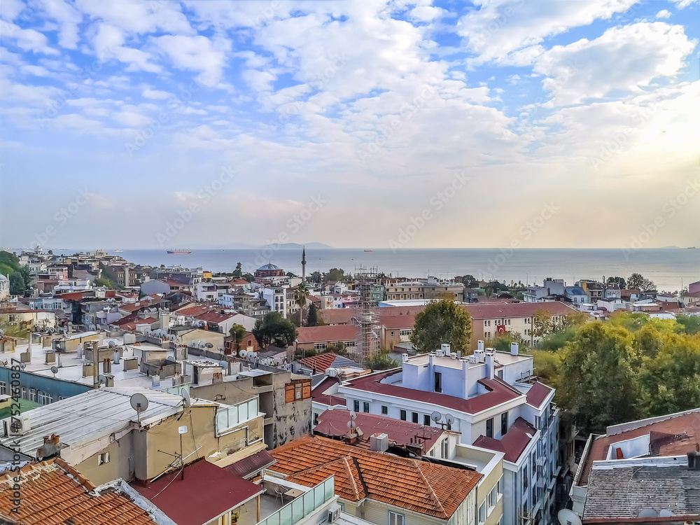 Top view of the rooftops of Istanbul and the Sea of Marmara on the horizon, Turkey. Drone view of the cityscape on the coastline of a Turkish city