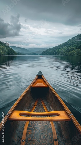 Canoeing on a Serene Lake: Paddles Dipping into the Tranquil Waters - Embracing Nature's Beauty and Adventure in a Peaceful Setting