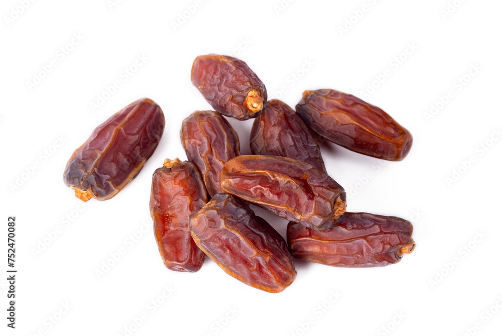 Dried date palm fruits on the white background Dried date palm fruits on the white background