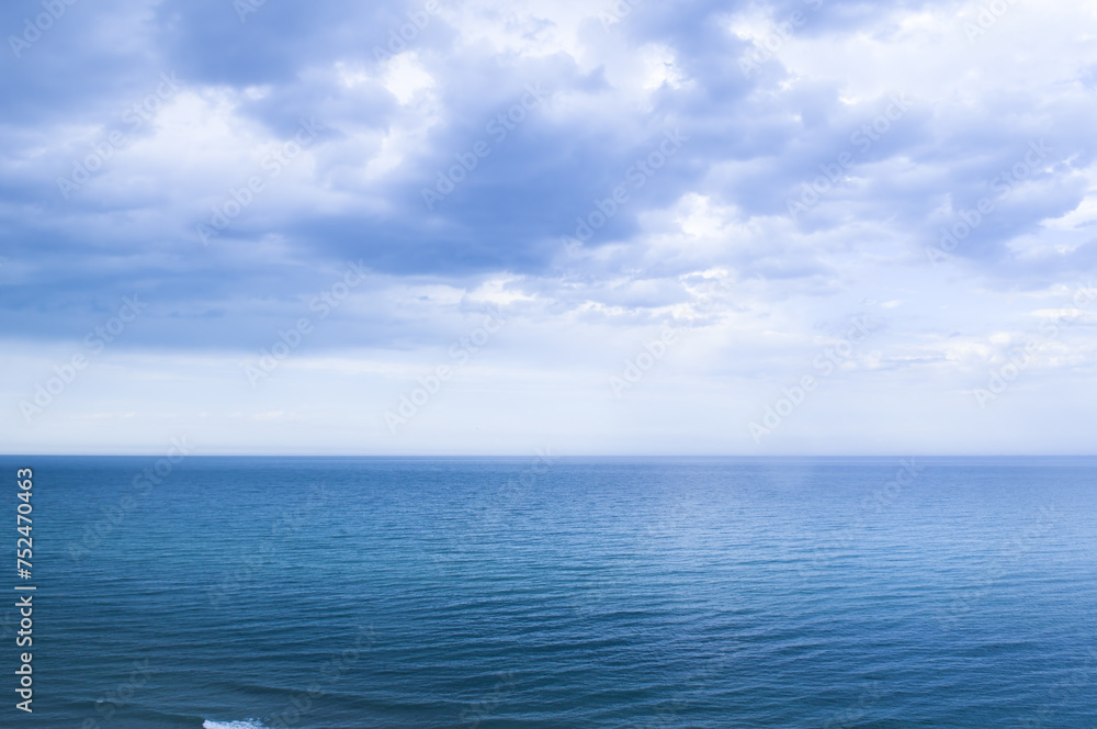 Calm windless ocean in blue tones. Calm windless ocean in blue tones.